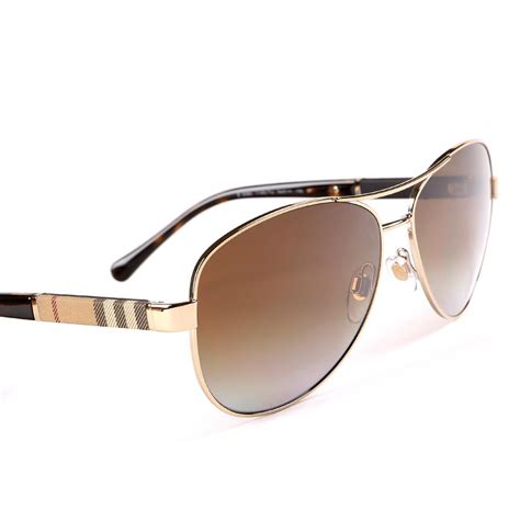 ladies burberry sunglasses metal logo|Burberry women's polarized sunglasses.